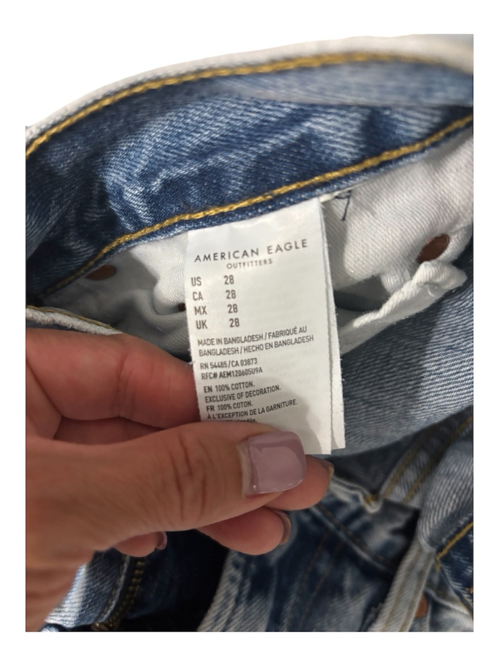 American Eagle Outfitters Light Blue Denim Jeans with Gold Stitching